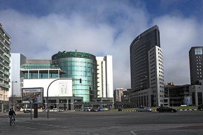 Innside by Melia Valencia Oceanic — El Corte Inglés building beside the rounded Valencia tower