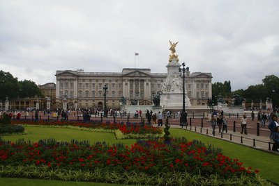 Buckingham Palace — Palace facade across flower beds and formal gardens